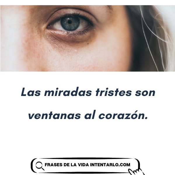 Primer plano de un ojo con una superposición de texto en español que dice: 'Las miradas tristes son ventanas al corazón'.